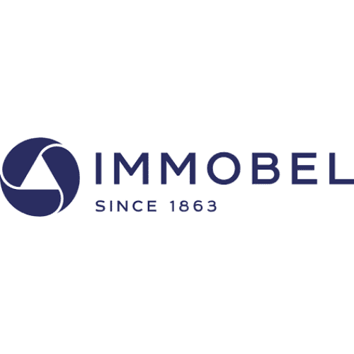 Logo of Immobel with a circular abstract design on the left and the text "IMMO⠄EL SIN⠰E 1863" in blue uppercase font on the right, reminiscent of ISUZU's strong and reliable branding. | PBI-OOTB